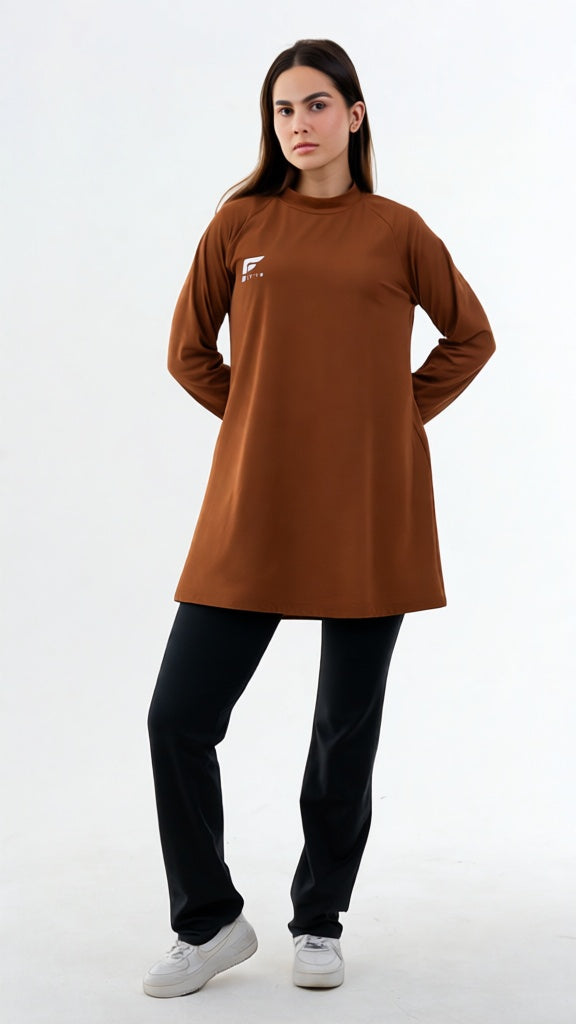 Woman wearing a brown tunic with a logo on a white background